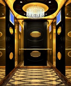 Interior de un ascensor con acabados de lujo en dorado y oro